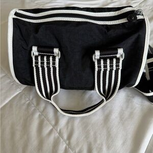 Kipling Black Bag with White Striped Handles